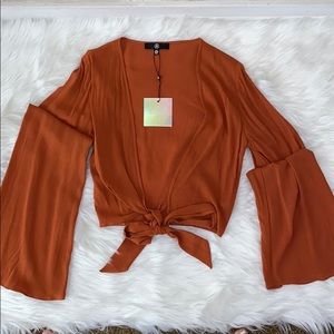 Missguided bell sleeved tie front crop top